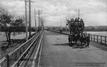 Cause Way Victoria Park WA looking north towards Perth. Note the telephone lines and the tram track adjacent to the overloaded coach.